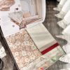Vải in hoa nhỏ trắng nền nâu beige