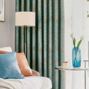Vải in thực vật kem vàng nền xanh ngọc